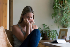Stressed woman thinking about her opiates drug problem