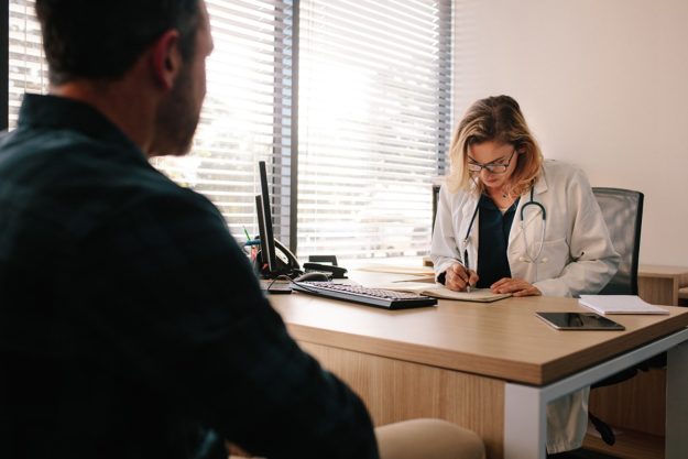 pennsylvania opiate addiction treatment centers man talking to doctors at different Pennsylvania opiate addiction treatment centers